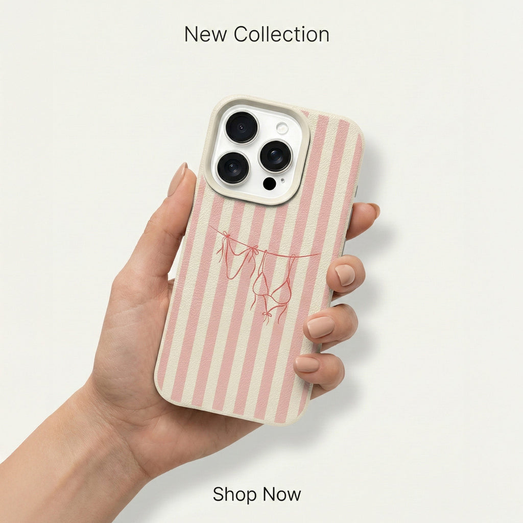 Hand holding a phone with a pink striped case on a light gray background