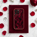 Phone case with rose design on a marble surface with rose petals