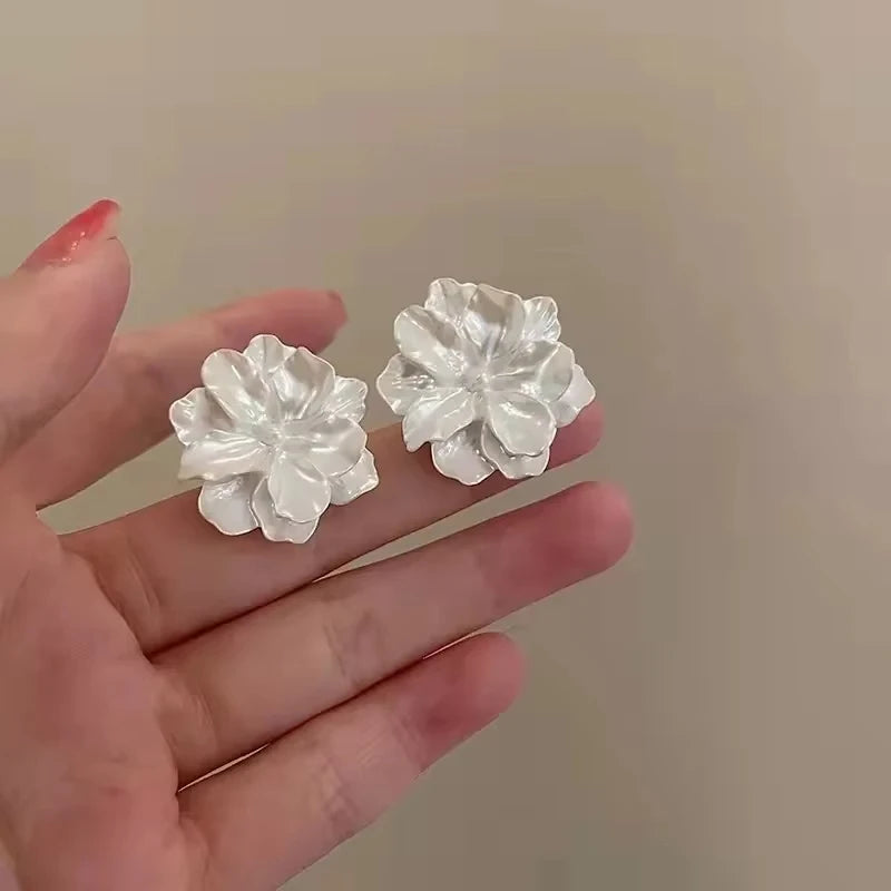 Acrylic white flower stud earring lifestyle